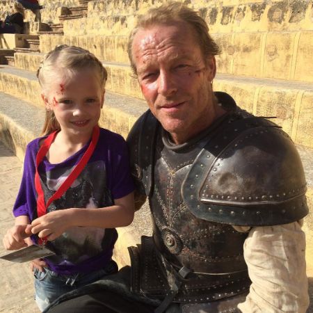 Finlay Glen's father Iain Glen and his sister took a picture at the set of Game of Thrones.